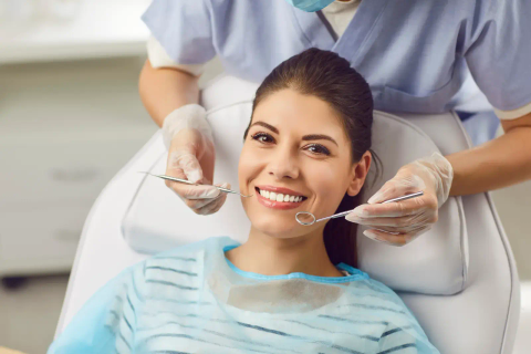 Patient smiling in the dental chair during a check-up