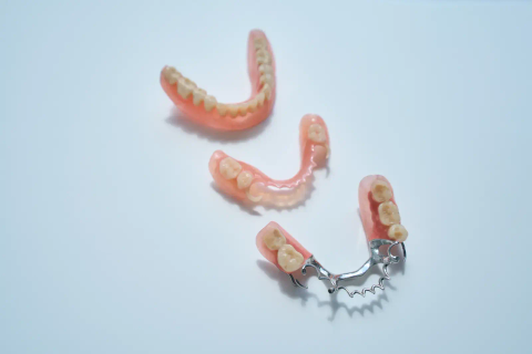 Full and partial dentures on a table